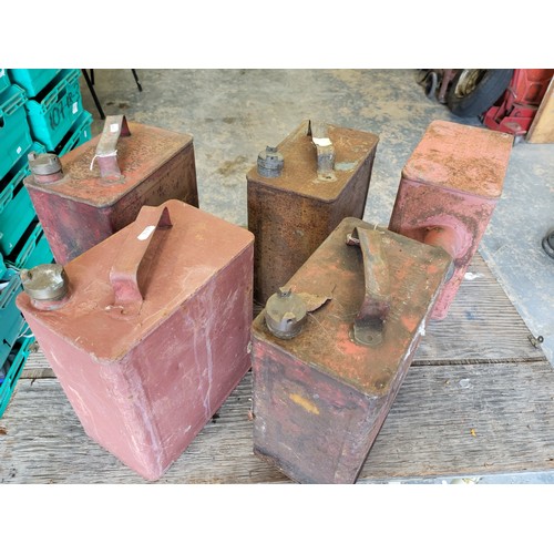 84 - Five vintage one-gallon metal fuel cans, one modified as a fuel tank. (5 items)