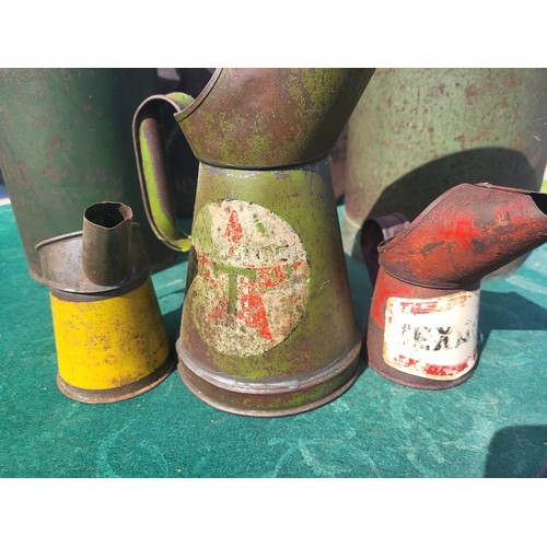 88 - Oil Cans including WD 1944 jerry can (Shell Lubrication) two other jugs and three pouring jugs (Shel... 