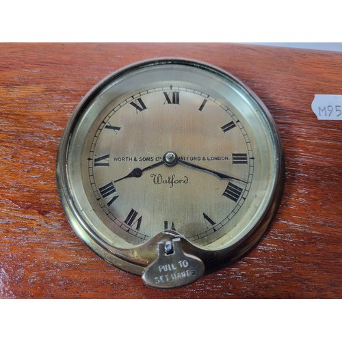 92 - A Watford Dashboard Clock, by North and Sons. Mounted in a Wooden Plaque. A Smiths, mounted in an ar... 