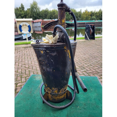 95 - An Oil Dispensing Pump, hand cranked. (1 item)