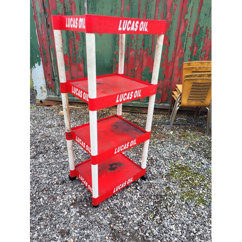 99 - A four tier Lucas Oils stand. Approximately 136cm x 60cm x 44cm. Will dismantle for transporting. (1... 