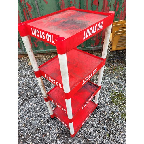 99 - A four tier Lucas Oils stand. Approximately 136cm x 60cm x 44cm. Will dismantle for transporting. (1... 