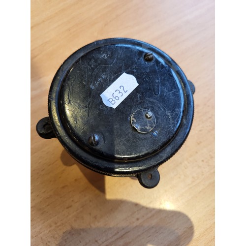 109 - Watford Car Clock, by North and Sons. Black face, front key wind, with securing ring and collar. (1 ... 