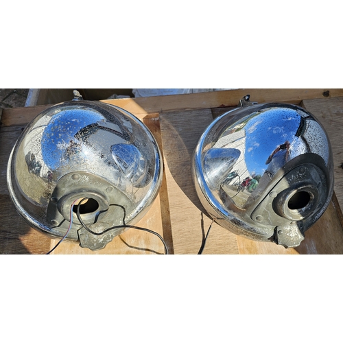 120 - A pair of Lucas P100 chrome headlamps. (2 items)