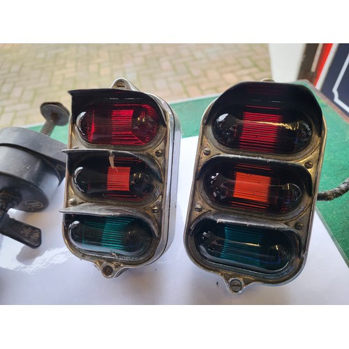 131 - Four 1930s Wilcot Robot Triple Indicator Lights, and two control switches. (6 items)