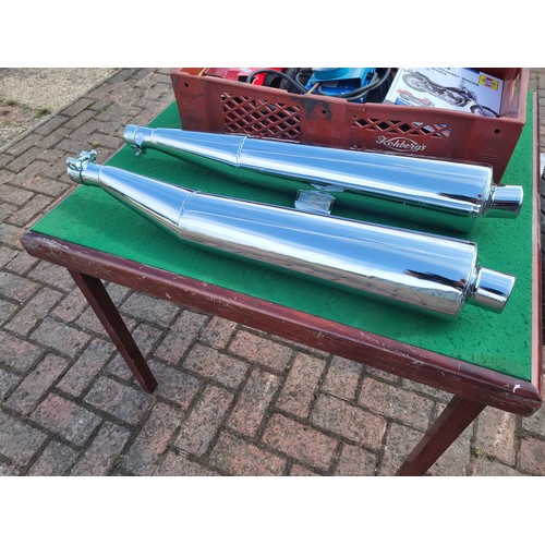 142 - A pair of new chromed steel Busso 660mm silencers for a classic bike, an unused 150/70/15 Bridgeston... 