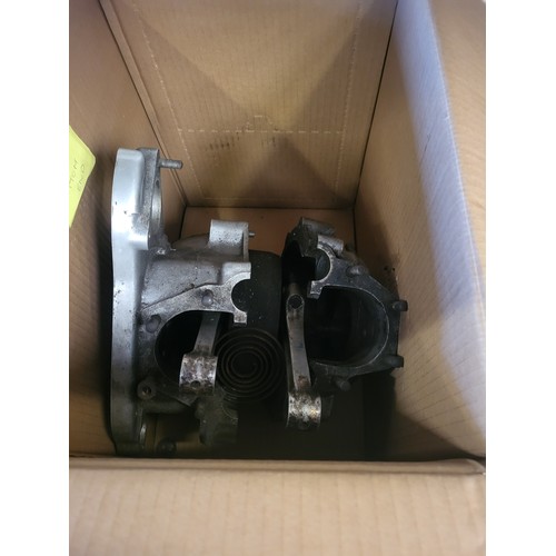 149 - Several boxes of motorcycle engine parts, to include a Triumph T100 bottom end unit, a gearbox, prim... 