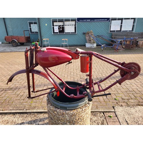 153 - A Bown motorcycle frame, and wheel, plus various sundry parts. c.1950. Designed to accept a 98cc Vil... 