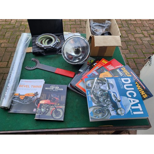 174 - Ducati Items, including a Marzocchi fork leg, a clutch and tool, a selection of Ducati and Italian b... 