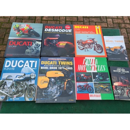 174 - Ducati Items, including a Marzocchi fork leg, a clutch and tool, a selection of Ducati and Italian b... 