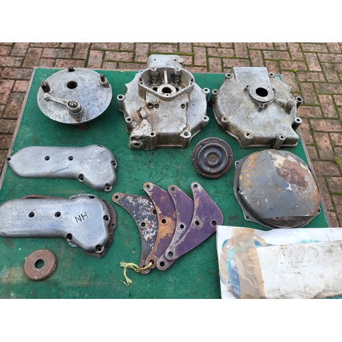 192 - Ariel motorcycle parts, including timing cases, front engine plates, clutch dome, two AMC crankcase ... 