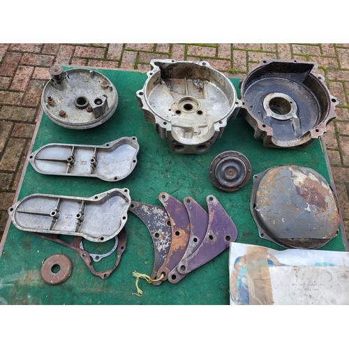 192 - Ariel motorcycle parts, including timing cases, front engine plates, clutch dome, two AMC crankcase ... 