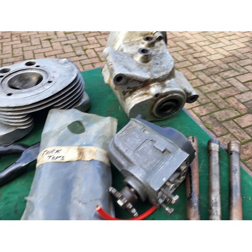 193 - AMC Motorcycle parts, including Gearbox casing, fork shrouds, lower frame rails, side stand, brake p... 