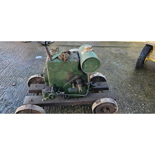 210 - A Ruston Hornsby stationary engine, 1 1/2/2hp engine. class PB trolley base,