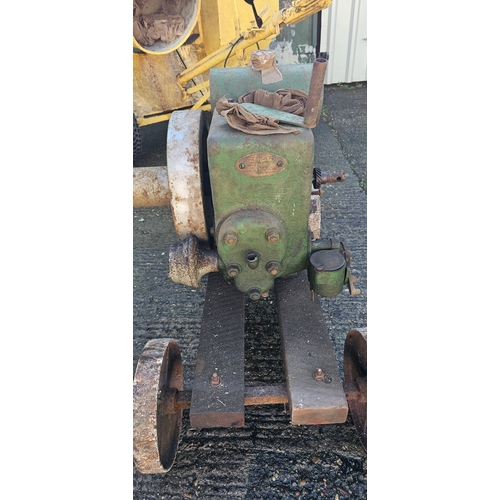 210 - A Ruston Hornsby stationary engine, 1 1/2/2hp engine. class PB trolley base. (1 item)