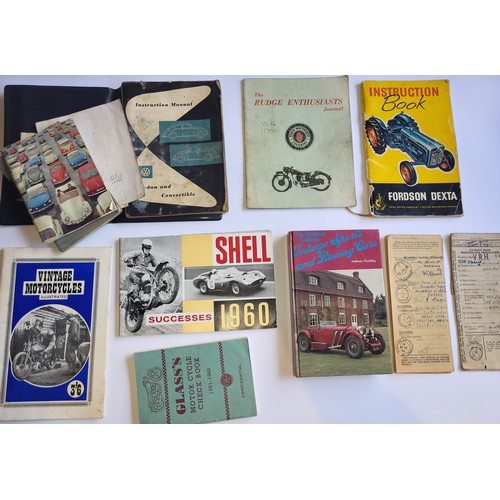 64 - Motoring Literature, including a 1964 Volkswagen Beetle owners pack (some water damage), two buff lo... 