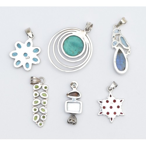 23 - Six silver and gemset pendants, to include garnet and peridot, the largest 50mm, 54gm