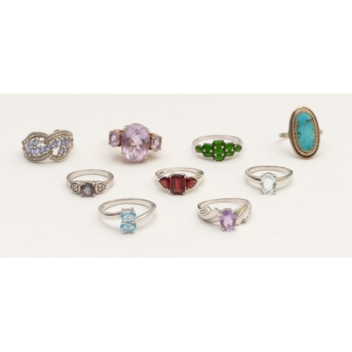 28 - Eight various silver and gemset rings, including diopside and tanzanite,  L - R, 26gm