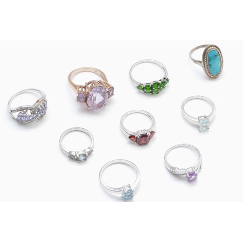 28 - Eight various silver and gemset rings, including diopside and tanzanite,  L - R, 26gm