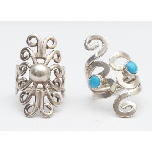 31 - Dominique Dinonart, a Mexican silver ring, V, and a turquoise and silver ring, 22gm