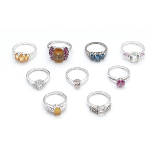 32 - Eight various silver and gemset rings, including opal and garnet,  L - R, 28gm