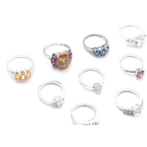 32 - Eight various silver and gemset rings, including opal and garnet,  L - R, 28gm