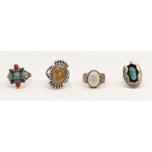 33 - Four silver silver Native American silver and stone set rings, including Carolyn Pollack, 36gm