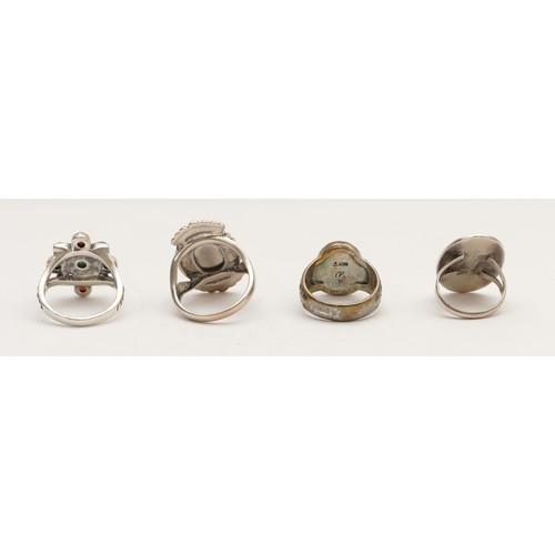 33 - Four silver silver Native American silver and stone set rings, including Carolyn Pollack, 36gm