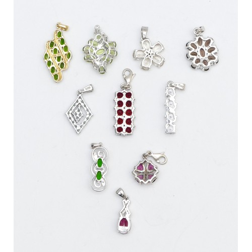 39 - Ten silver and gemstone set pendants, including diopside and garnet, 26gm