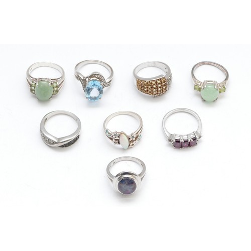 51 - Eight various silver and gemset rings, including opal and garnet, O - R, 36gm