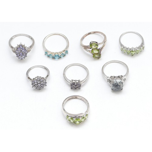 52 - Eight various silver and gemset rings, including tanzanite and peridot, J - R, 23gm