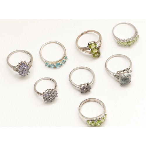 52 - Eight various silver and gemset rings, including tanzanite and peridot, J - R, 23gm