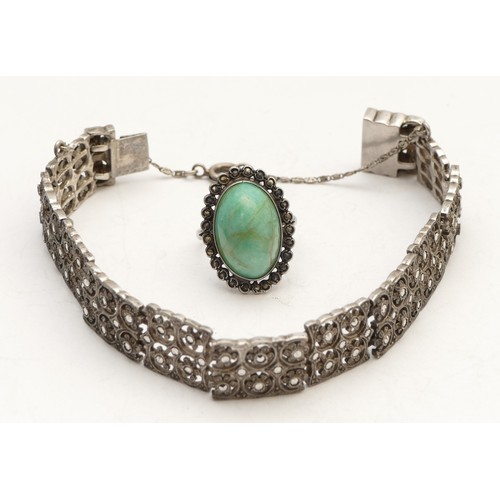 55 - An Art Deco unmarked silver and marcasite bracelet, 18cm and a silver, turquoise and marcasite ring,... 