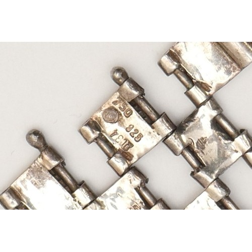 57 - A Modernist 925 silver/750 gold open panel link bracelet, 18cm, 48gm