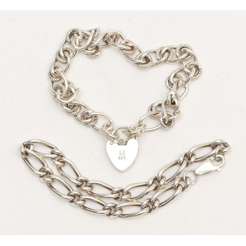 61 - Two silver curb link bracelets, 36gm