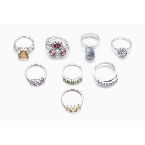 70 - Eight various silver gemset rings, including tanzanite and garnet, M - P, 32gm