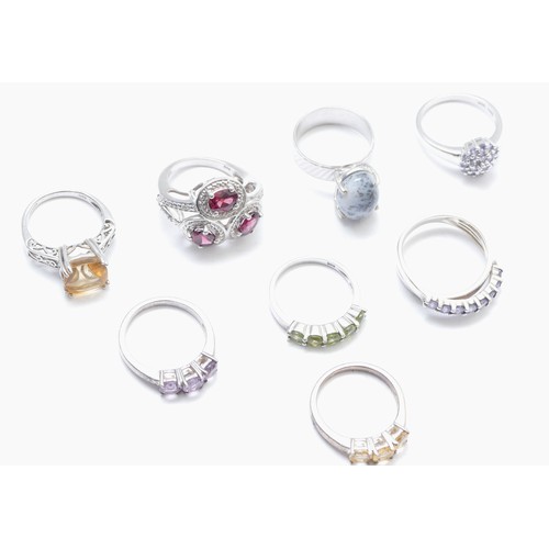 70 - Eight various silver gemset rings, including tanzanite and garnet, M - P, 32gm