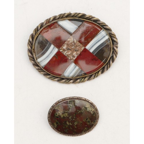 71 - A Victorian Scottish unmarked silver and hardstone St. Andrews cross brooch, 50mm and a smaller broo... 