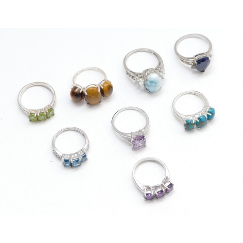 72 - Eight various silver gemset rings, including larimar and sapphire, N - R, 32gm