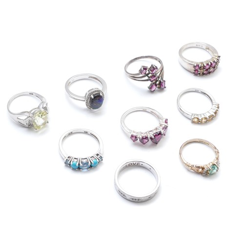 76 - Eight various silver gemset rings, including topaz and garnet, M - P, 30gm