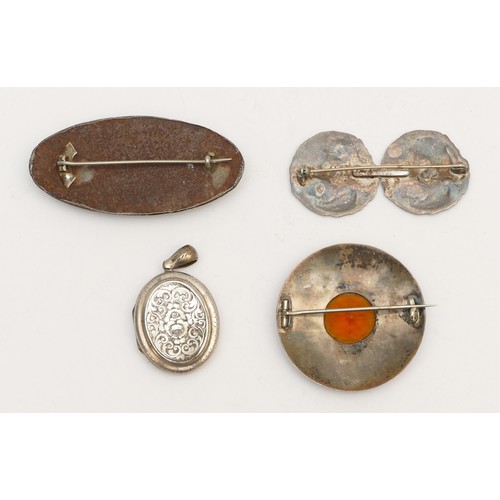 82 - A pewter and Ruskin panel brooch, 65mm, a Victorian silver back and front locket and two brooches