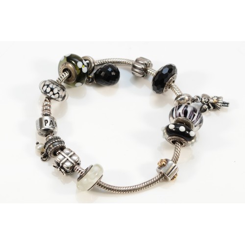 90 - Pandora, a silver bracelet with eight charms, 50gm