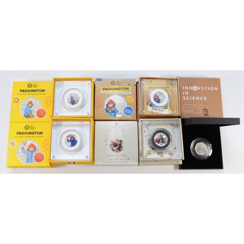 103 - Royal Mint, a collection of five silver proof 50p coins to include coins from Paddington, Harry Pott... 