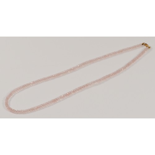 574 - A 9ct gold clasp rose quartz beaded necklace, 10.2g