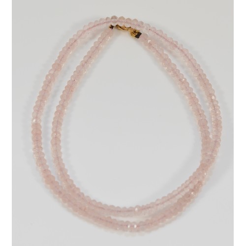 574 - A 9ct gold clasp rose quartz beaded necklace, 10.2g