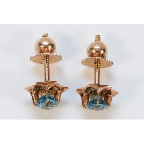 577 - A pair of 9ct rose gold blue zircon floral earrings with screw on backs, 5mm blue zircon, 3.1g