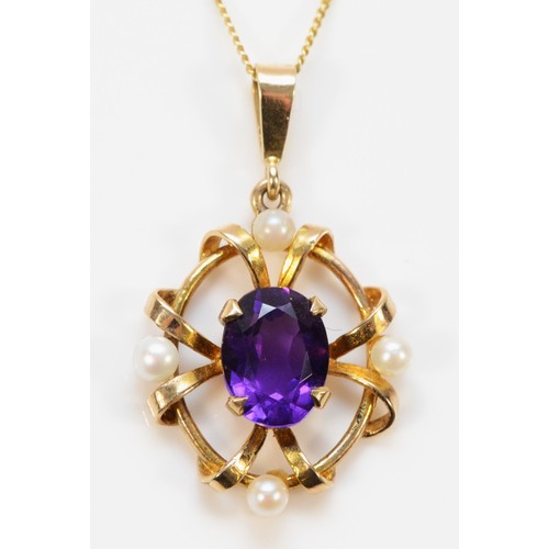 581 - A 9ct gold amethyst and seed pearl pendant with chain, 20mm pendant length, 2.7g