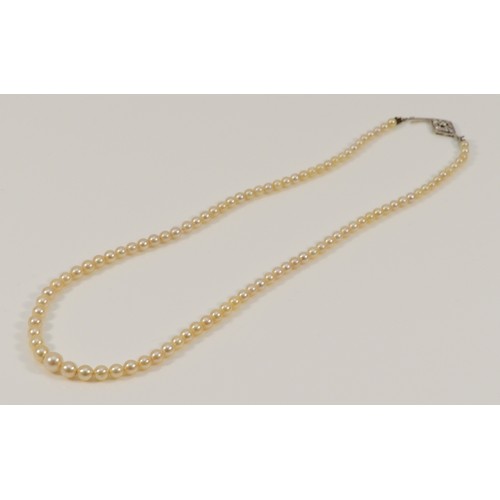 583 - A .900 platinum and diamond clasp vintage cultured pearl necklace, 12g