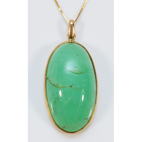 587 - A 14k gold green gemstone pendant, 30mm x 15mm, 7.9g