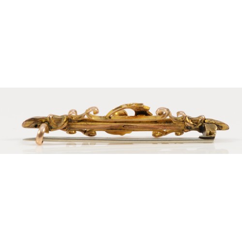 593 - A Victorian 9ct gold seed pearl bar brooch with base metal pin, 45mm across, 2.3g